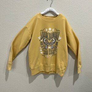 One yellow and one green Abercrombie sweatshirt. Girls size 9 to 10.